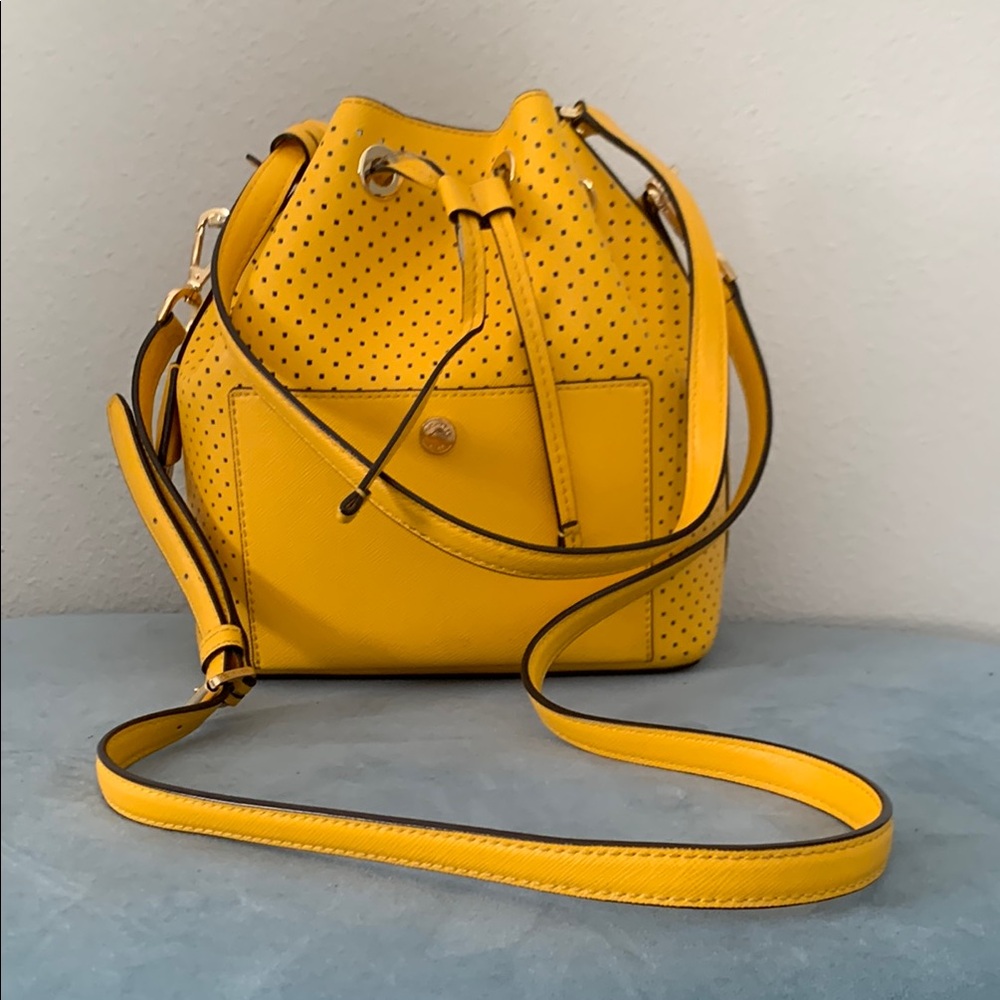 Micheal Kors Yellow Perforated Leather Bucket Bag - USED